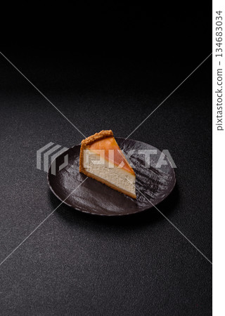 New York cheesecake, a slice of sweet pie, a classic cheesecake dessert. New York cheesecake 134683034