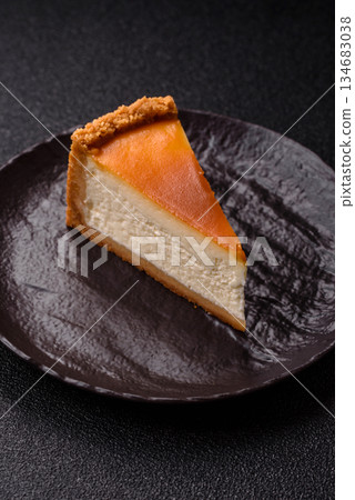 New York cheesecake, a slice of sweet pie, a classic cheesecake dessert. New York cheesecake 134683038