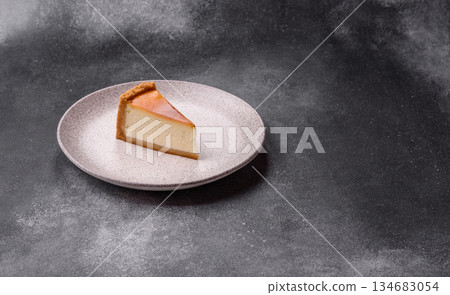 New York cheesecake, a slice of sweet pie, a classic cheesecake dessert. New York cheesecake 134683054