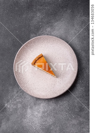 New York cheesecake, a slice of sweet pie, a classic cheesecake dessert. New York cheesecake 134683056