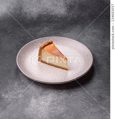 New York cheesecake, a slice of sweet pie, a classic cheesecake dessert. New York cheesecake 134683057