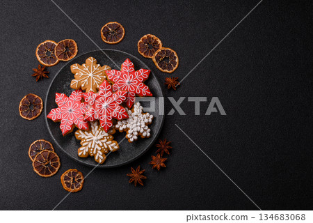 Gingerbread, Christmas cookies, and ornamental holiday baked goods. Christmas gingerbread Gingerbread, Christmas cookies, and ornamental holiday baked goods. Christmas gingerbread 134683068