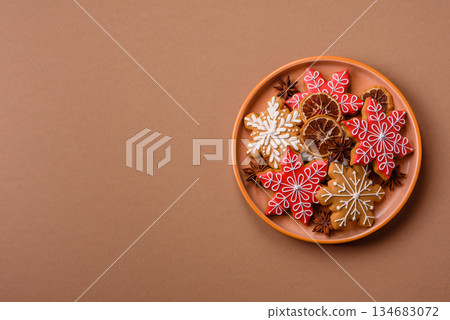 Gingerbread, Christmas cookies, and ornamental holiday baked goods. Christmas gingerbread Gingerbread, Christmas cookies, and ornamental holiday baked goods. Christmas gingerbread 134683072
