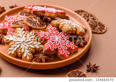 Gingerbread, Christmas cookies, and ornamental holiday baked goods. Christmas gingerbread Gingerbread, Christmas cookies, and ornamental holiday baked goods. Christmas gingerbread 134683079