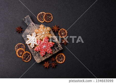 Gingerbread, Christmas cookies, and ornamental holiday baked goods. Christmas gingerbread Gingerbread, Christmas cookies, and ornamental holiday baked goods. Christmas gingerbread 134683099