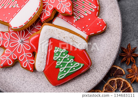 Gingerbread, Christmas cookies, and ornamental holiday baked goods. Christmas gingerbread Gingerbread, Christmas cookies, and ornamental holiday baked goods. Christmas gingerbread 134683111