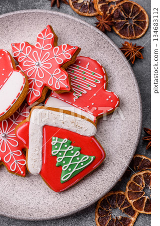 Gingerbread, Christmas cookies, and ornamental holiday baked goods. Christmas gingerbread Gingerbread, Christmas cookies, and ornamental holiday baked goods. Christmas gingerbread 134683112