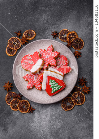 Gingerbread, Christmas cookies, and ornamental holiday baked goods. Christmas gingerbread Gingerbread, Christmas cookies, and ornamental holiday baked goods. Christmas gingerbread 134683116