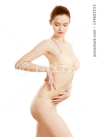 Beautiful slim woman wearing lace lingerie. 134683553