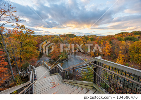 Sunset Over Autumn Valley from Wooden Lookout Sunset Over Autumn Valley from Wooden Lookout 134686476