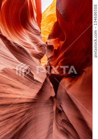 Deep Slot Canyon Passage with Strong Red and Orange Contrast 134686508