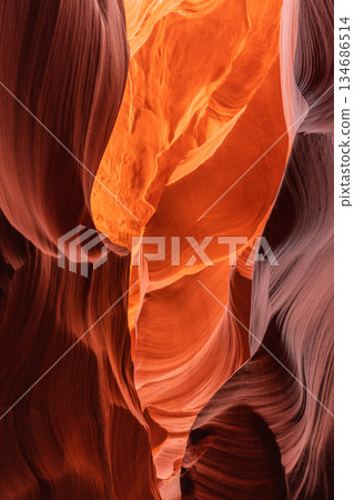 Narrow Slot Canyon Passage with Intense Orange Illumination 134686514