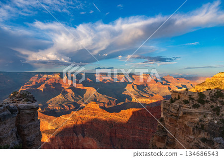 Vast Grand Canyon Panorama Under Blue Sky Vast Grand Canyon Panorama Under Blue Sky 134686543