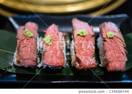 Wagyu Beef Sushi Platter on Rice and Banana Leaf 134686544