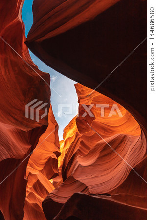 Vertical Shot Upward through Slot Canyon to Sky Above 134686580
