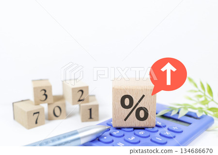 Concept of interest rate or interest rate increase with calculator and percentage sign. 134686670
