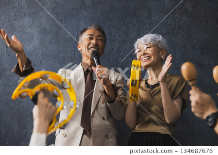 Smiling senior couple with arms crossed 134687676