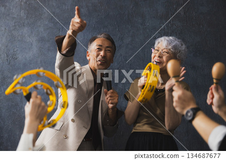 Smiling senior couple with arms crossed 134687677