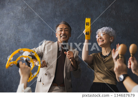 Smiling senior couple with arms crossed 134687679