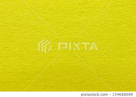 Yellow-green paper surface Yellow-green paper surface 134688099