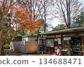 Mukojima Hyakkaen Gardens' gift shop and autumn leaves in the Japanese garden 134688471