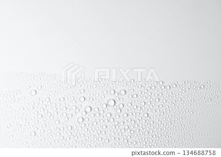 Water drops on a white background Water drops on a white background 134688758