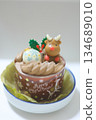 Christmas cake with cute reindeer and snowflake ornaments 134689010