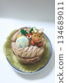 A cute Christmas cake decorated with chocolate cream and reindeer 134689011