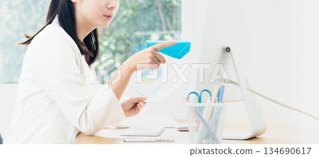 A young woman creating documents 134690617