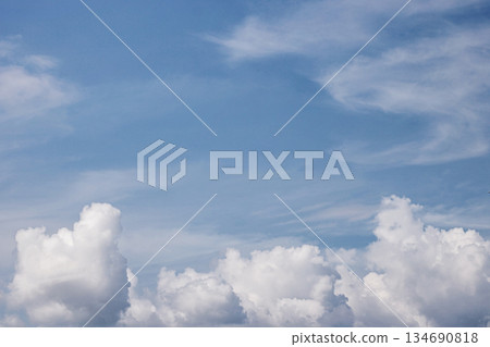 Expansive Blue Sky with Fluffy White Clouds. Cloudy Sky. Cloudscape Atmosphere. Nature and Climate Concept. Daylight Clouds Sky. High quality photo 134690818