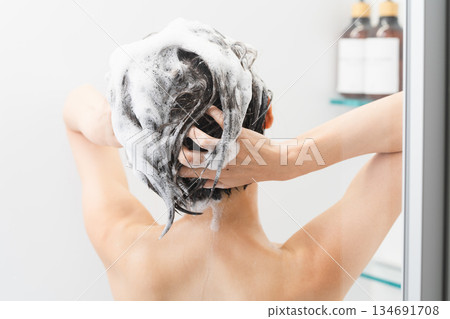 Woman shampooing beauty image 134691708