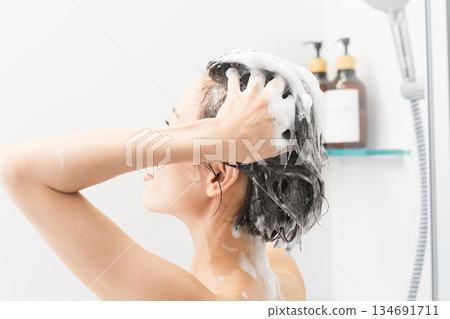 Woman shampooing beauty image 134691711