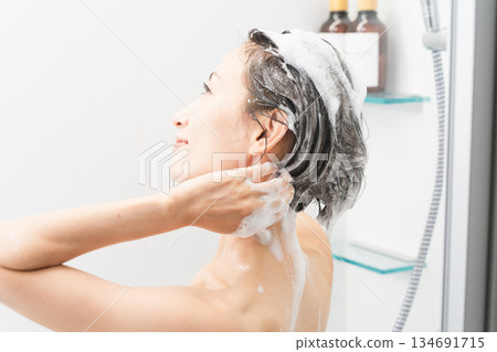 Woman shampooing beauty image 134691715