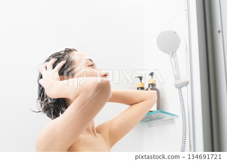 Woman shampooing beauty image Woman shampooing beauty image 134691721