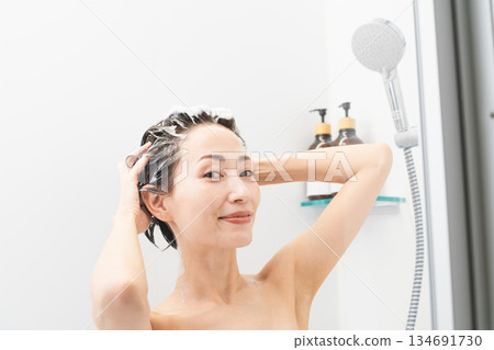 Woman shampooing beauty image Woman shampooing beauty image 134691730