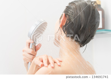 Woman shampooing beauty image Woman shampooing beauty image 134691741