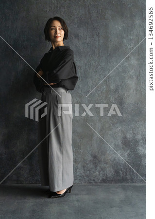 Posing short-haired woman beauty image Posing short-haired woman beauty image 134692566