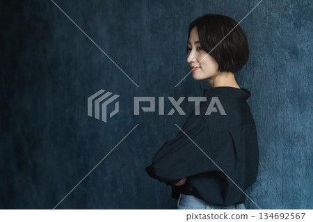 Posing short-haired woman beauty image Posing short-haired woman beauty image 134692567