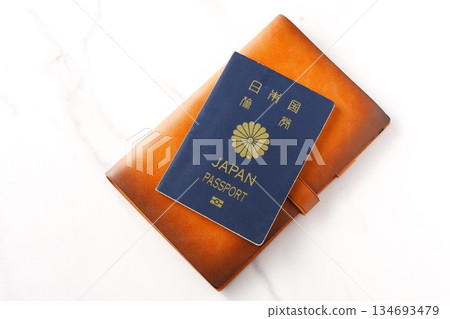 Passport - Image of preparing a passport (5-year general passport, navy blue) and planning a trip abroad Passport - Image of preparing a passport (5-year general passport, navy blue) and planning a trip abroad 134693479
