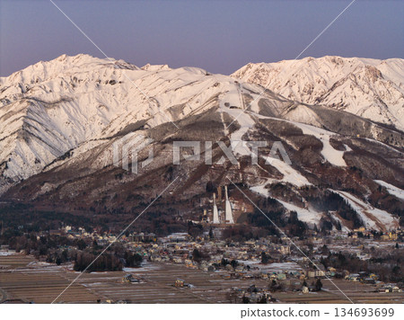 Beautiful Mount Karamatsu and Happo-One Ski Resort before sunrise, Hakuba Village, Nagano Prefecture (aerial shot by drone) Beautiful Mount Karamatsu and Happo-One Ski Resort before sunrise, Hakuba Village, Nagano Prefecture (aerial shot by drone) 134693699