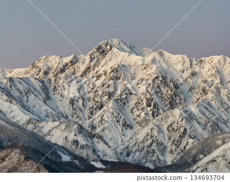 Beautiful Mount Goryu before sunrise, Hakuba Village, Nagano Prefecture (aerial shot by drone) Beautiful Mount Goryu before sunrise, Hakuba Village, Nagano Prefecture (aerial shot by drone) 134693704
