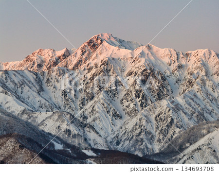 Beautiful morning glow on Mount Goryu in Hakuba Village, Nagano Prefecture (aerial shot by drone) Beautiful morning glow on Mount Goryu in Hakuba Village, Nagano Prefecture (aerial shot by drone) 134693708