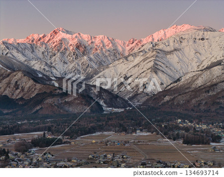 Beautiful morning glow at Mount Karamatsu and Mount Goryu in Hakuba Village, Nagano Prefecture (aerial shot by drone) Beautiful morning glow at Mount Karamatsu and Mount Goryu in Hakuba Village, Nagano Prefecture (aerial shot by drone) 134693714