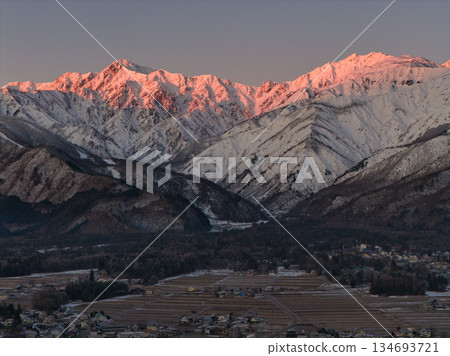 Beautiful morning glow at Mount Karamatsu and Mount Goryu in Hakuba Village, Nagano Prefecture (aerial shot by drone) Beautiful morning glow at Mount Karamatsu and Mount Goryu in Hakuba Village, Nagano Prefecture (aerial shot by drone) 134693721