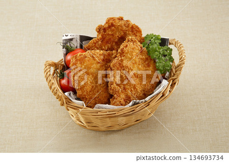 Fried chicken in a basket Fried chicken in a basket 134693734