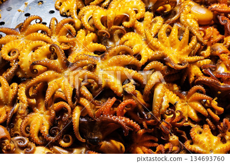 Close up of Fried Baby Octopus as Thai Street Food. 134693760