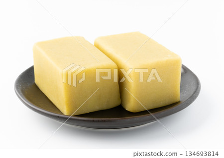 Sweet potato yokan on a plate on a white background 134693814