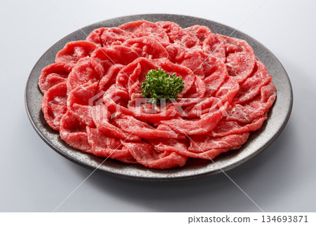 Domestic beef round shabu-shabu meat served on a plate Domestic beef round shabu-shabu meat served on a plate 134693871