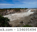 Waterfall with rocky rapids in the Mekong River at Khone Phapheng,  in Laos 134695494