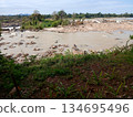 Waterfall with rocky rapids in the Mekong River at Khone Phapheng,  in Laos 134695496